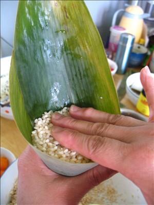 咸蛋黄五花肉粽怎么做，咸蛋黄五花肉粽怎么做好吃，咸蛋黄五花肉粽做法